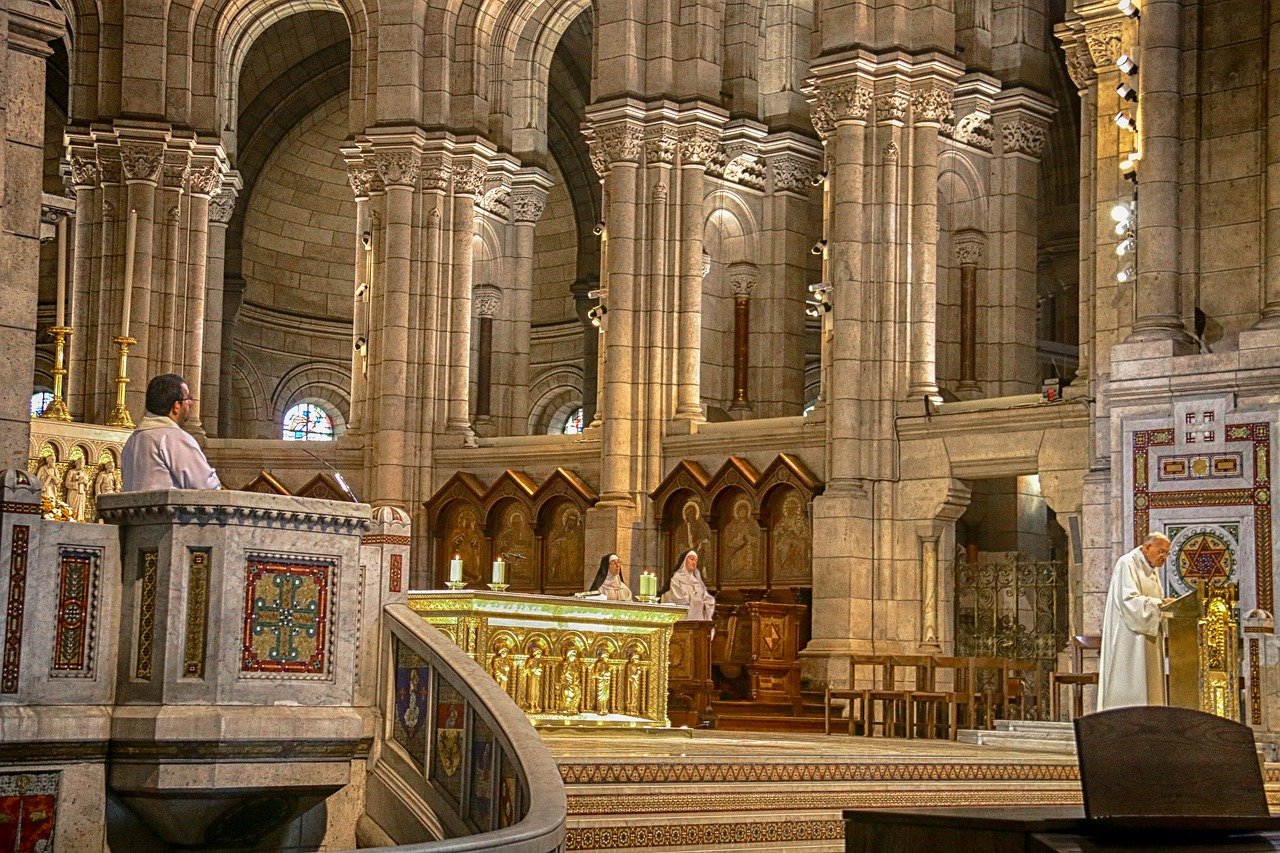 bishop performs mass in the cathedral