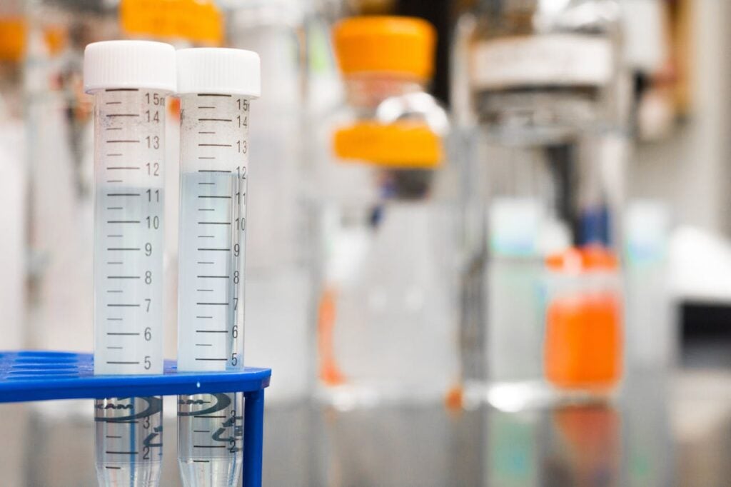 laboratory flasks with clear liquid