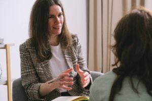 woman speaking to other person