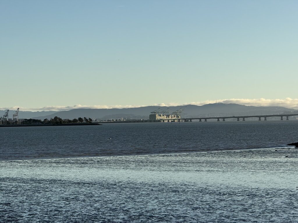Calm lake with distant mountains