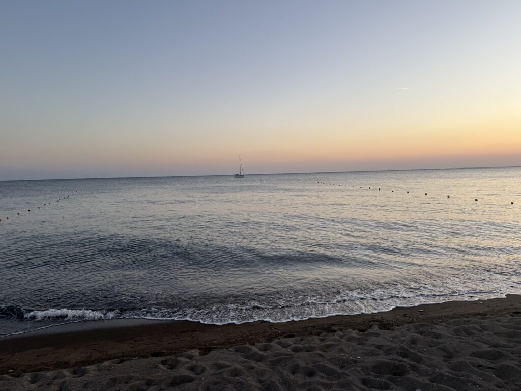 Calm ocean at sunset horizon